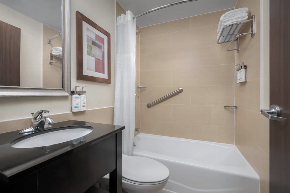 Standard Room, 2 Double Beds, City View | Bathroom | Combined shower/tub, free toiletries, hair dryer, towels