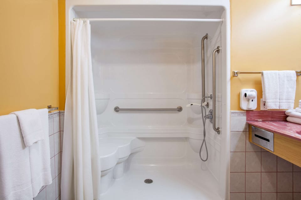 Deluxe Room, 2 Queen Beds, Accessible, Non Smoking | Bathroom | Combined shower/tub, deep soaking tub, free toiletries, hair dryer