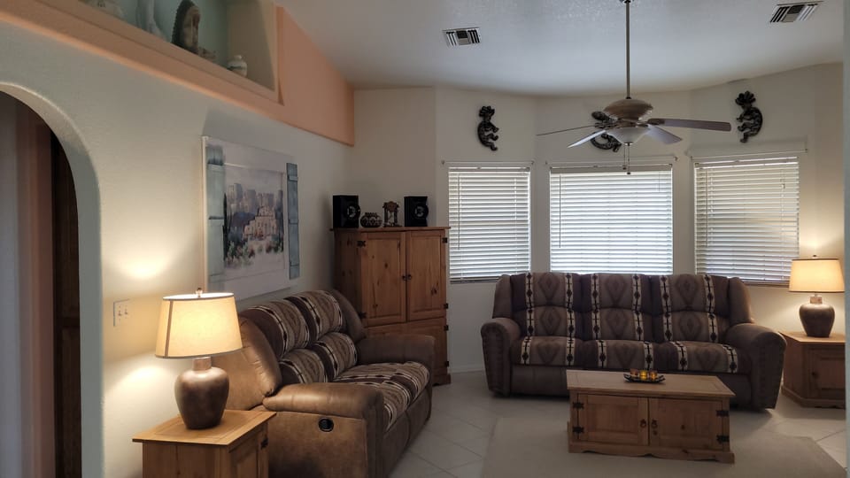 Living room with 4 recliners 