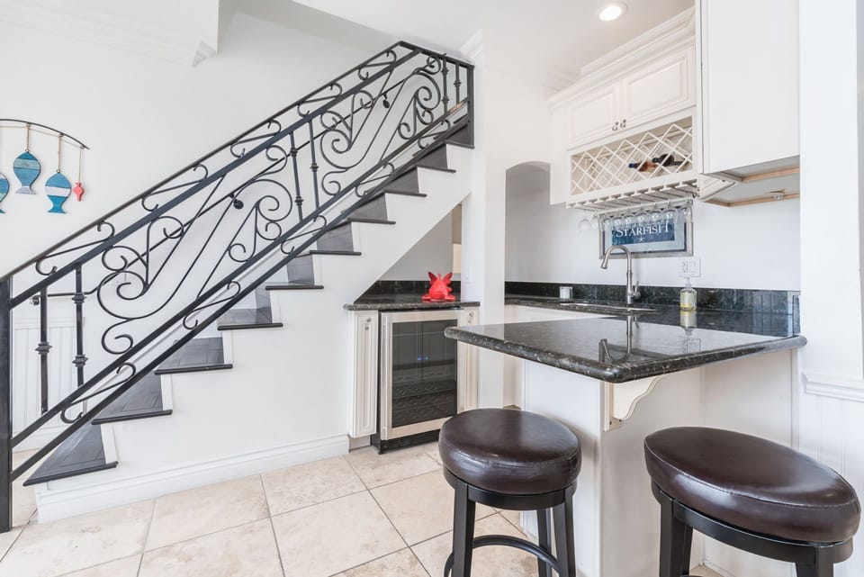 The ground floor wet bar is the perfect set-up for entertaining.
                