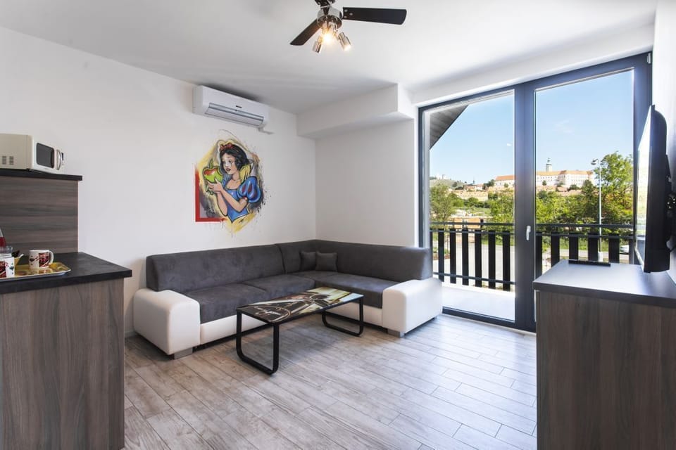 Cartoon Apartment (15) | Living room | 102-cm LCD TV with digital channels, TV
