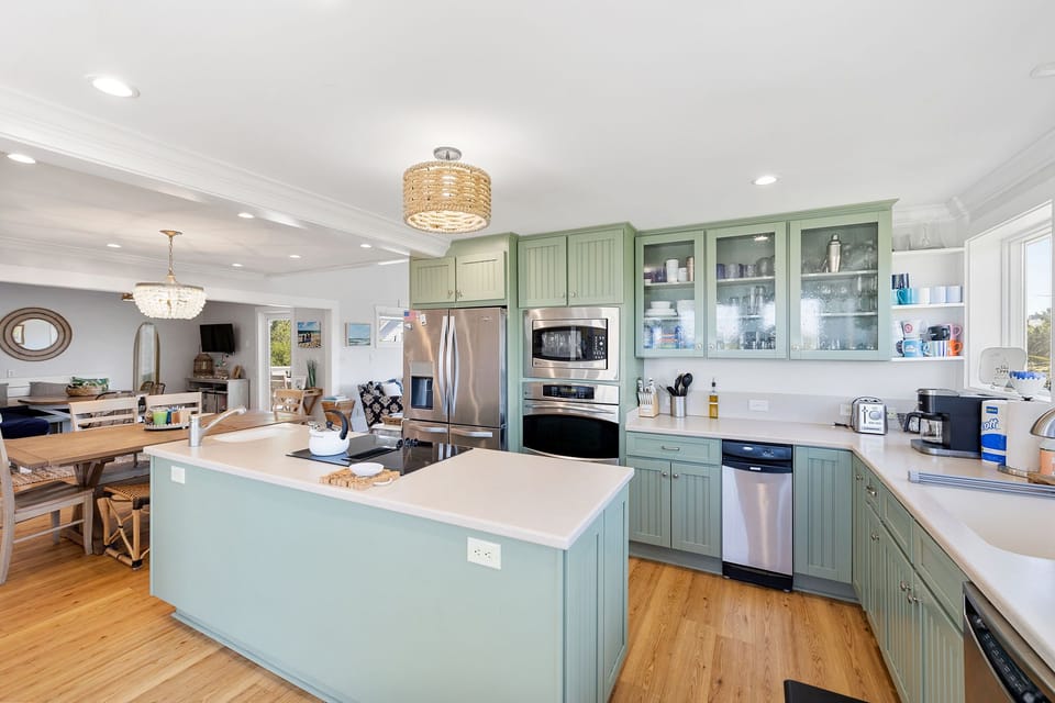 Modern kitchen with nearby dining table and breakfast nook