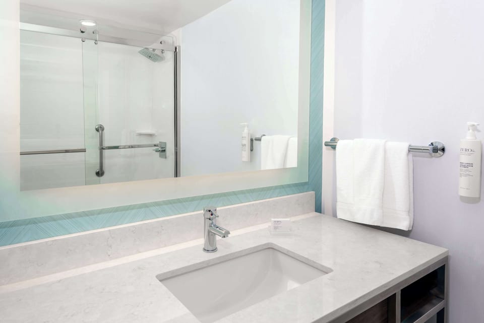Hair dryer, towels, soap, shampoo