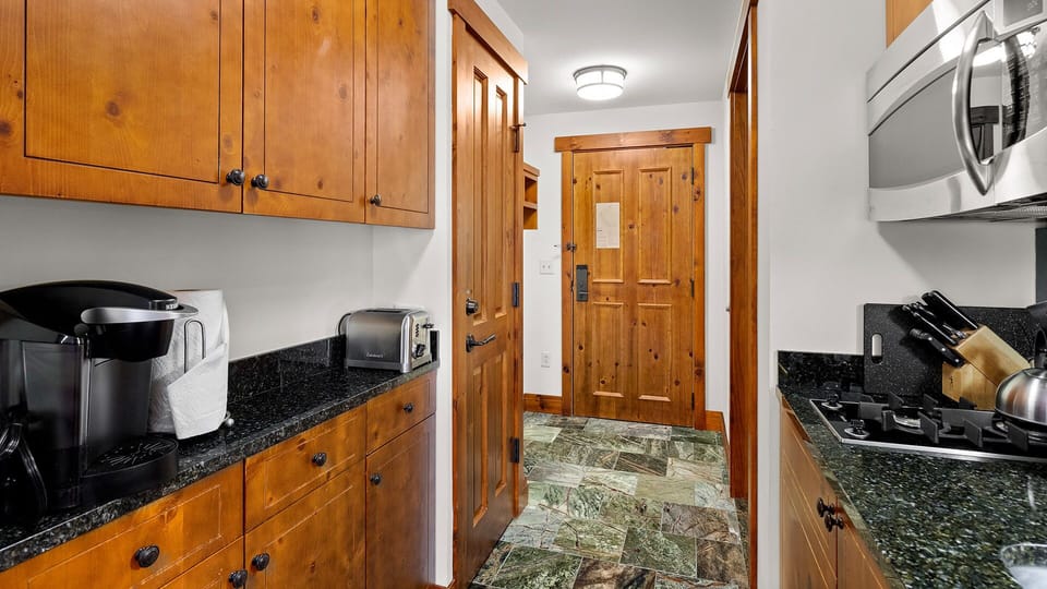 Ski jacket and boot storage in entry hall