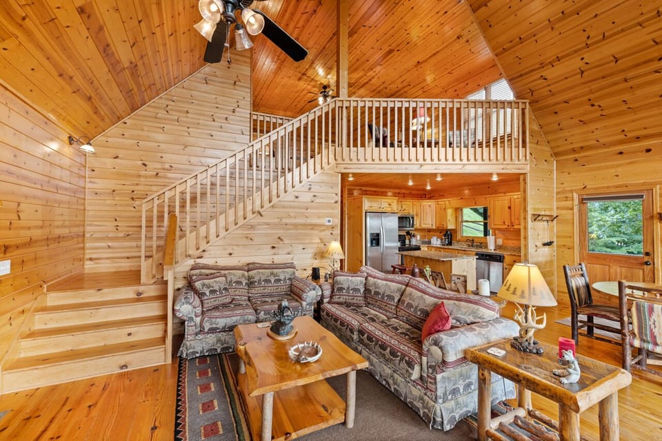 [Living area] Open floor plan. Stairs lead up towards the loft & master bedroom. 
