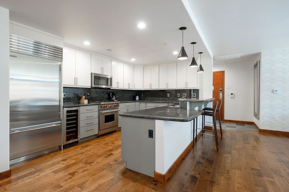 Fully equipped kitchen with granite slab two tier buffet counter