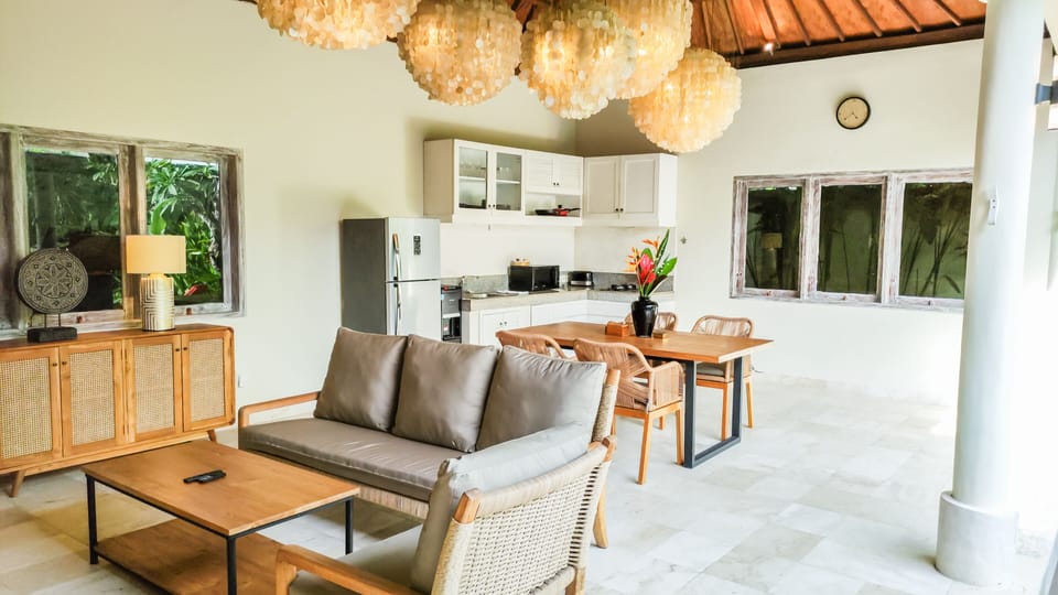 Premier Villa, 2 Bedrooms, Accessible, Pool View | Living area | 32-inch LED TV with cable channels, TV, DVD player