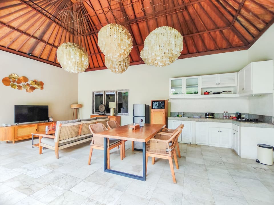 Premier Villa, 2 Bedrooms, Accessible, Pool View | Living area | 32-inch LED TV with cable channels, TV, DVD player