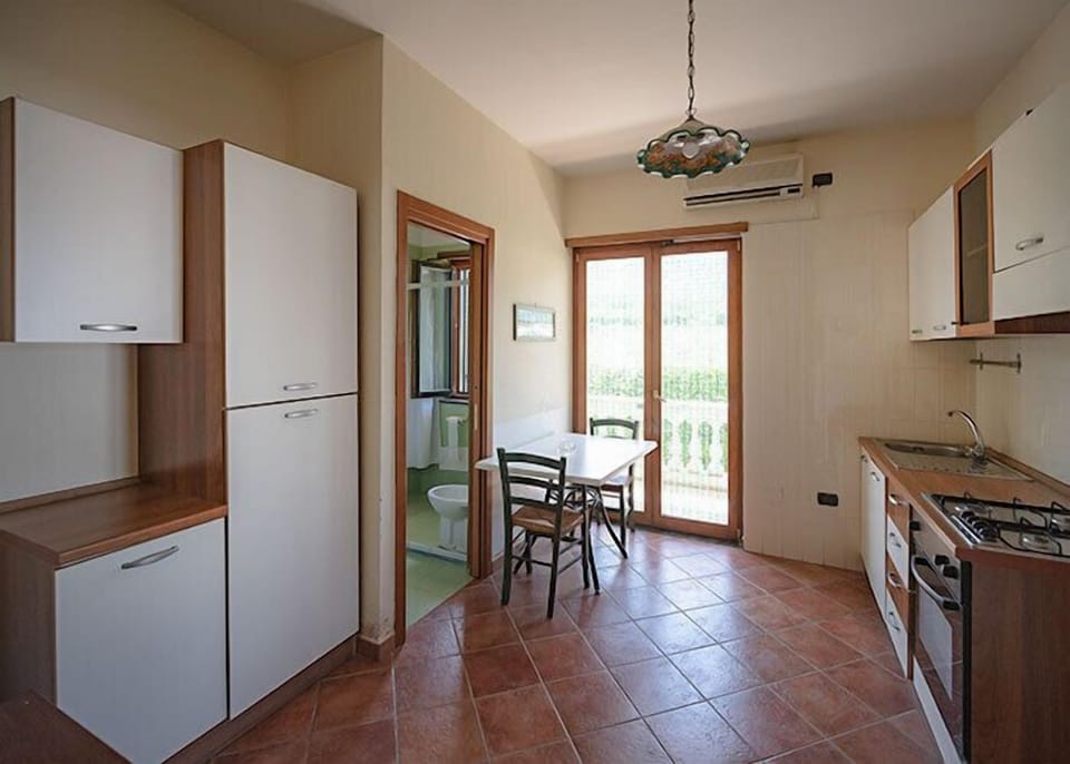 Apartment, 2 Bedrooms | Living area | 22-inch flat-screen TV with digital channels, TV