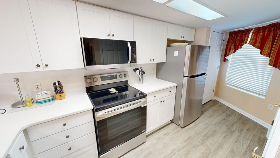 Condo, 2 Bedrooms | Private kitchen | Fridge, coffee/tea maker, toaster