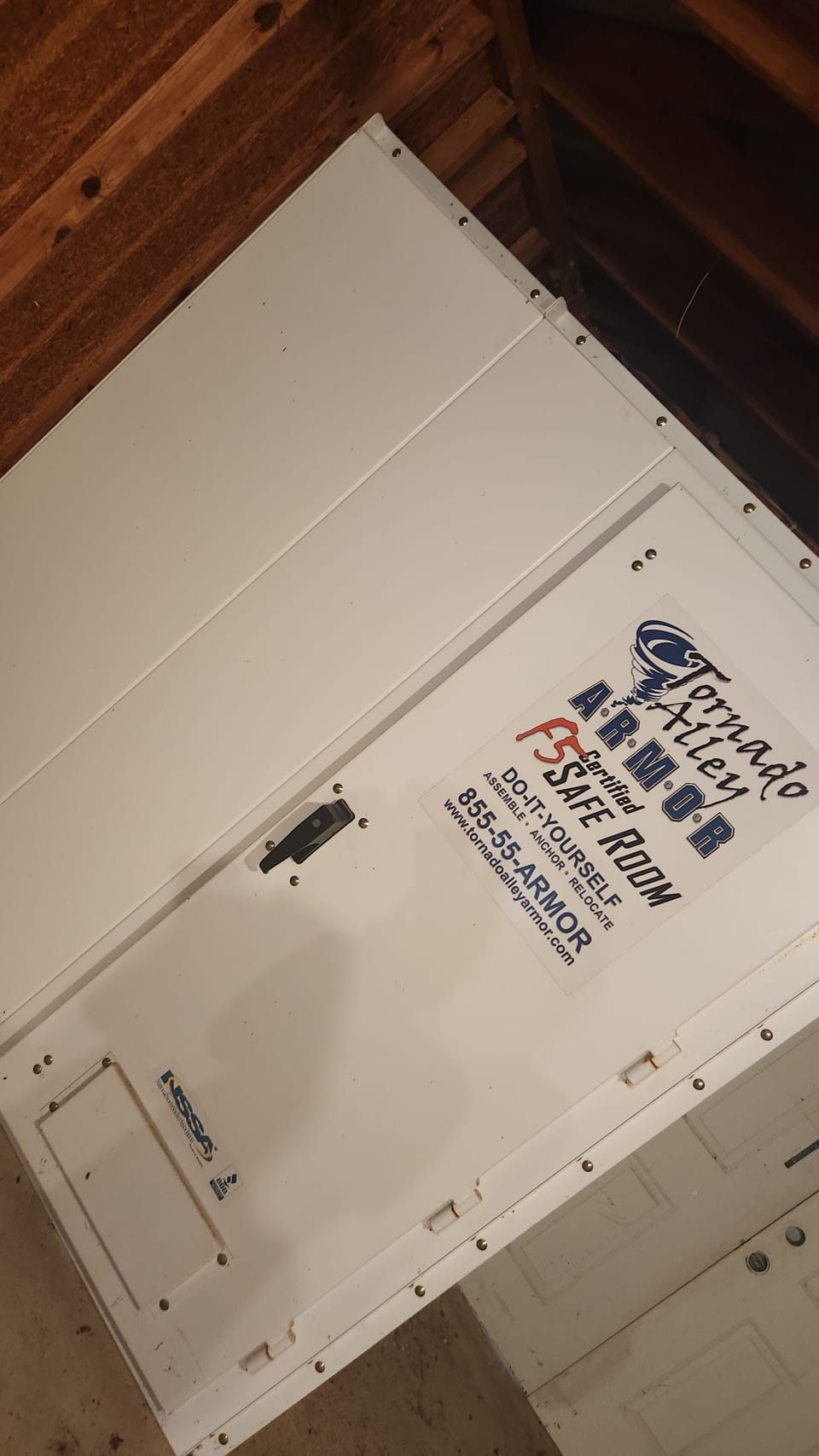 above ground storm shelter in detached garage