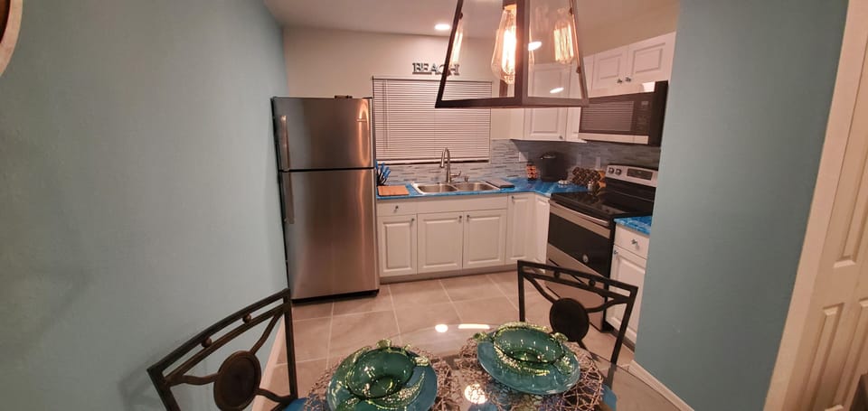 The new kitchen has everything you need to cook a nice meal.