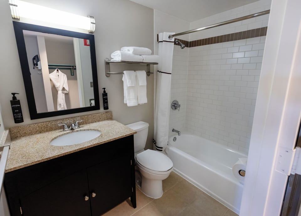 Deluxe Room, 2 Queen Beds | Bathroom | Free toiletries, hair dryer, towels