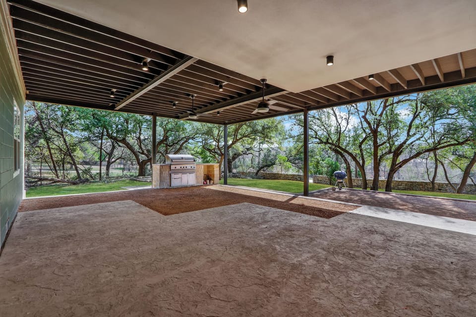 Covered outdoor grilling station