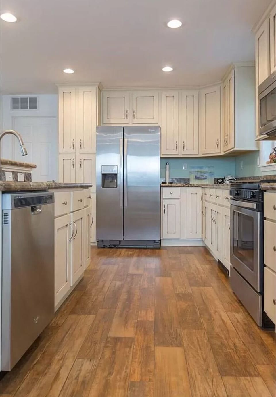 Open kitchen, living and dining area seats 10. 