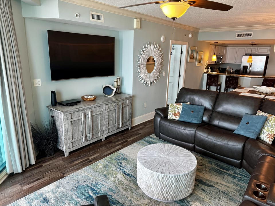 Cozy living room with plush seating and modern entertainment