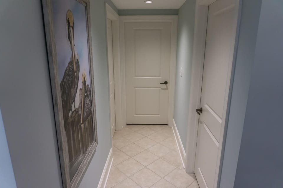 Bright, cozy hallway leading to your private retreat