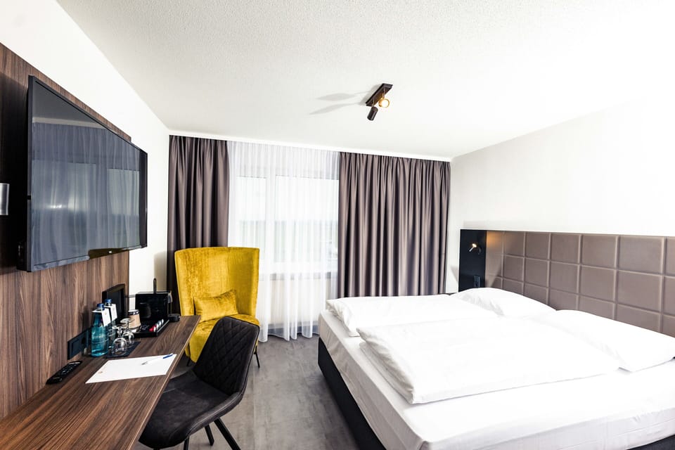 Comfort Double Room (Airport View) | Hypo-allergenic bedding, desk, blackout drapes, soundproofing