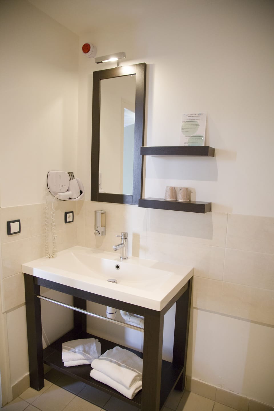 Eco-friendly toiletries, hair dryer, towels, soap