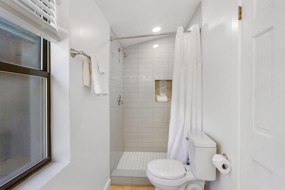 Standing tile shower in the bathroom