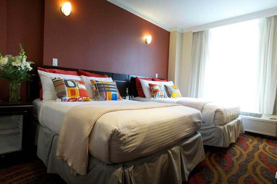 Premium bedding, pillowtop beds, in-room safe, blackout drapes