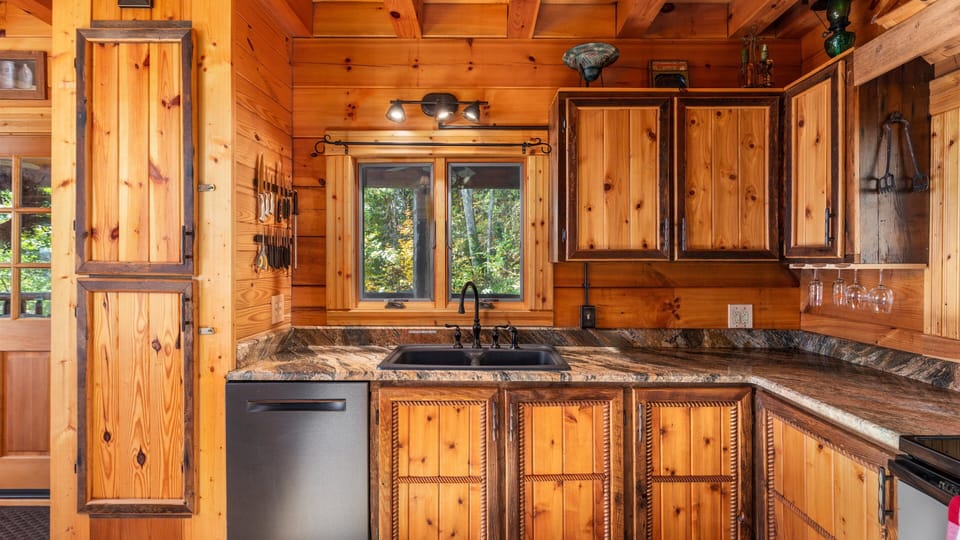 Main Level Kitchen. Granite Countertops. Bosch Dishwasher. Handmade Cabinets. 