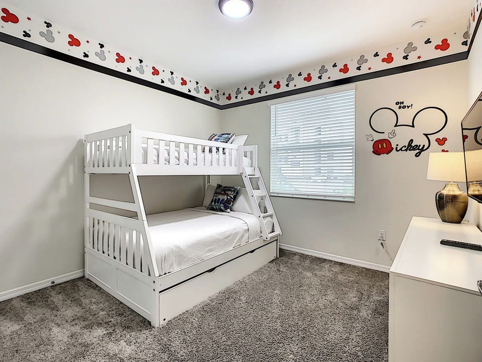 Playful Mickey-Themed Bedroom with White Bunk Bed