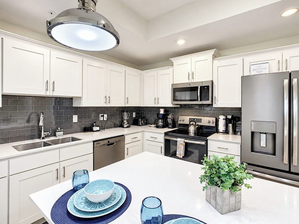 Modern Kitchen with Island and Stainless Steel Appliances