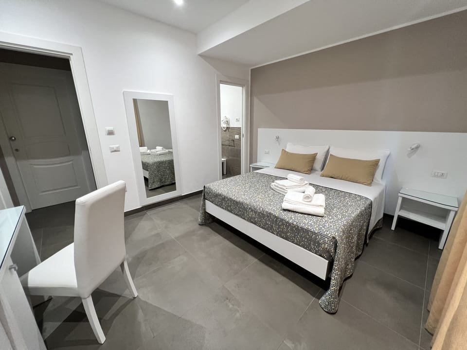Deluxe Double or Twin Room | Minibar, in-room safe, desk, laptop workspace