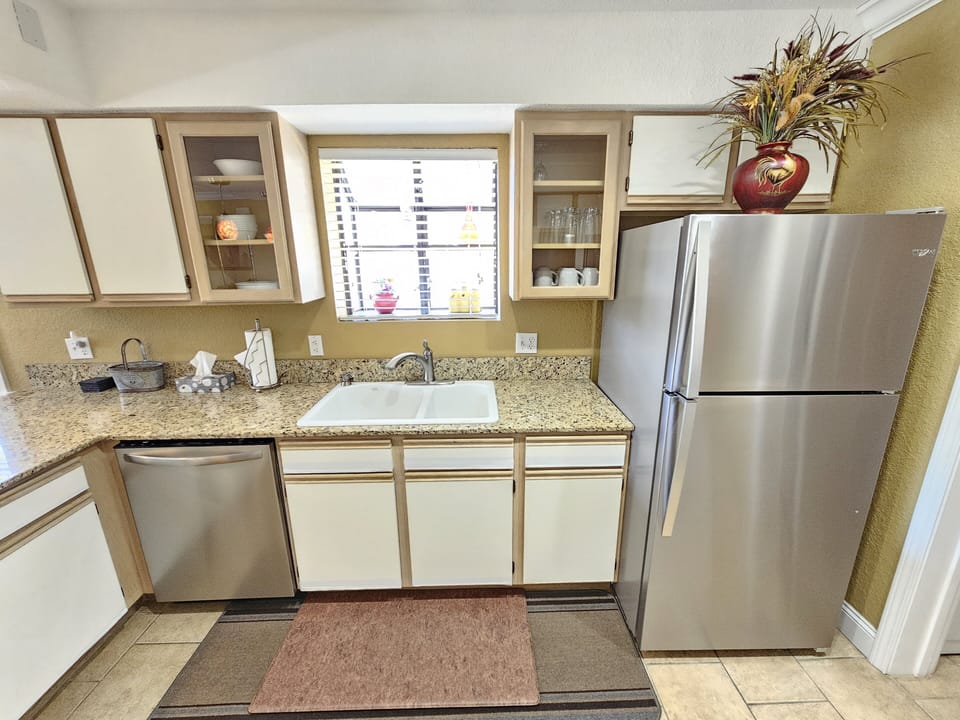 New granite counters and stainless-steel appliances in your full-sized kitchen!