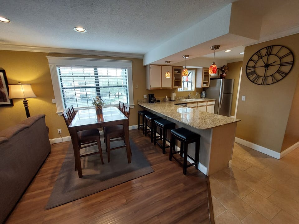 Beautiful dining area and breakfast bar with ample seating for the whole family!