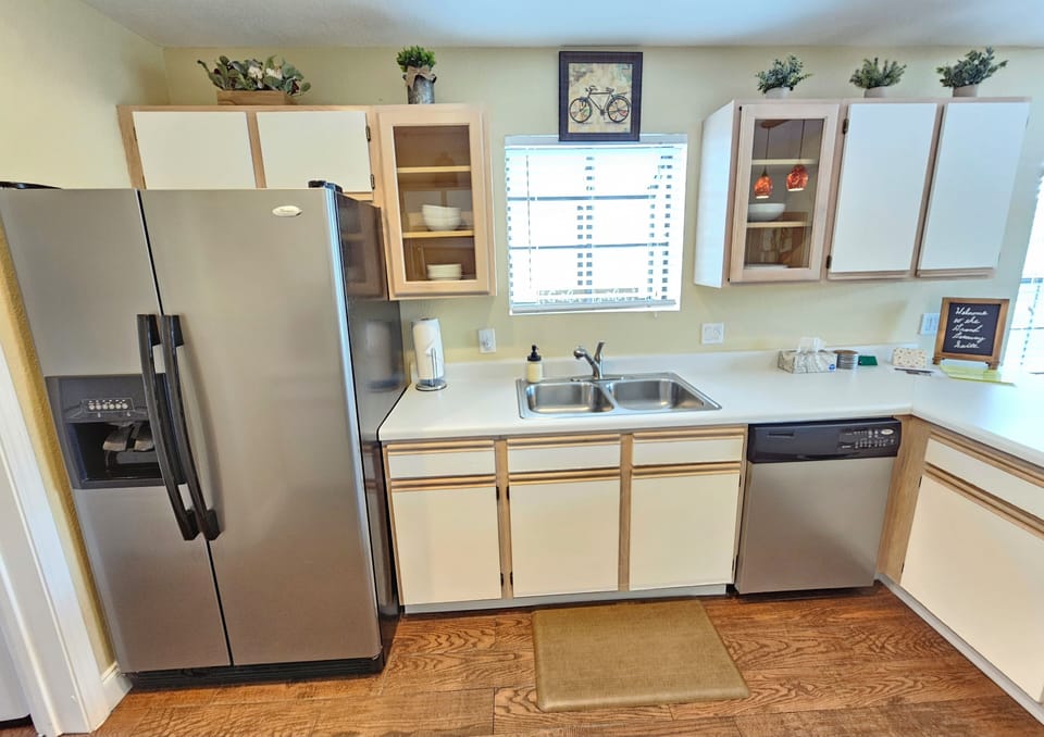 Large kitchen, full-sized appliances, & fully stocked with everything needed!