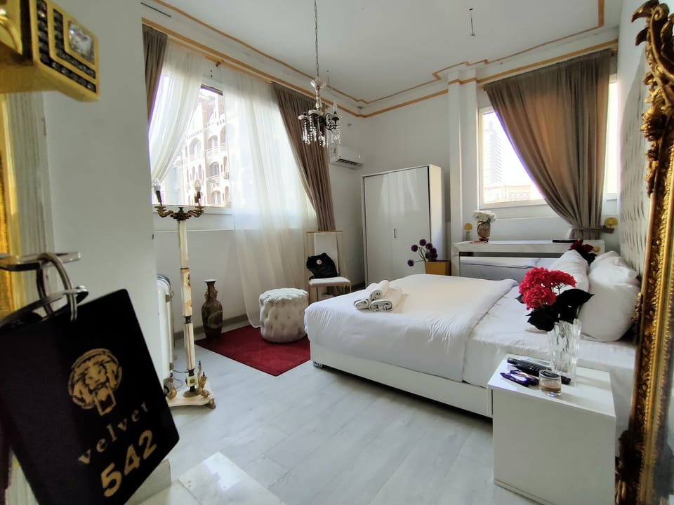 Family Room With Balcony | Hypo-allergenic bedding, desk, free rollaway beds, bed sheets