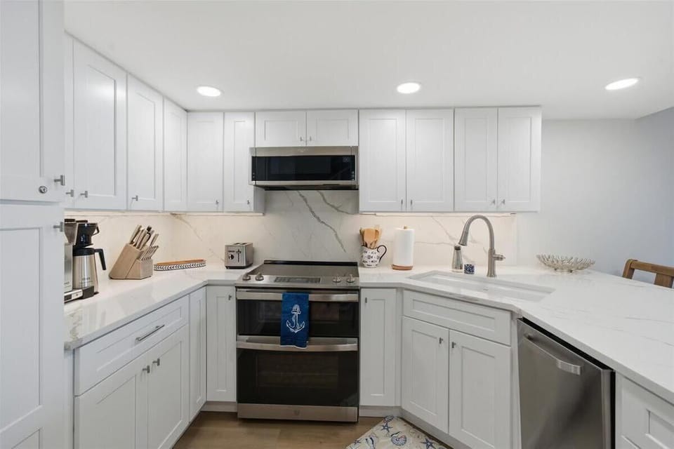 Bright, modern kitchen with sleek appliances and ample counter space