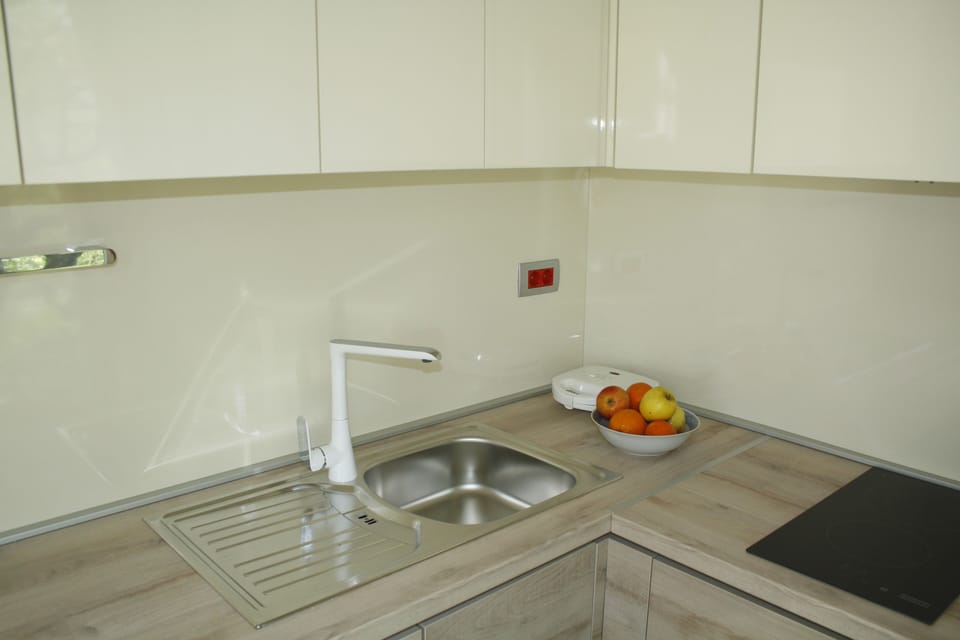 Premium Mobile Home | Private kitchen | Full-size fridge, microwave, coffee/tea maker, electric kettle