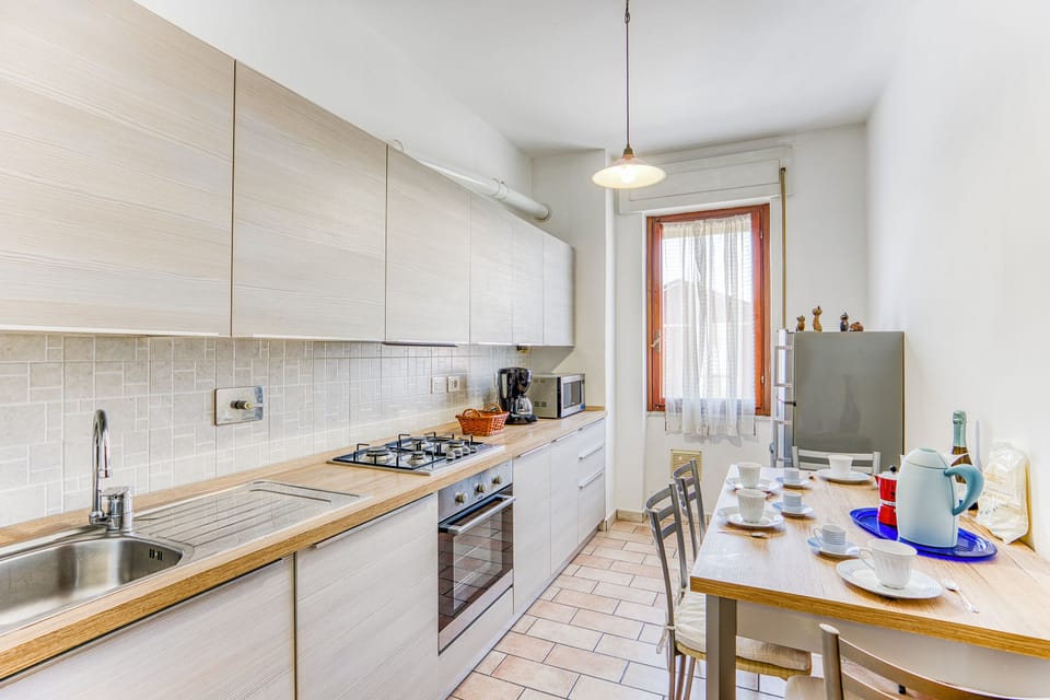 Family Apartment, 1 Bedroom, Balcony (Casa Arno 500m from beach) | Private kitchen | Full-size fridge, microwave, oven, stovetop