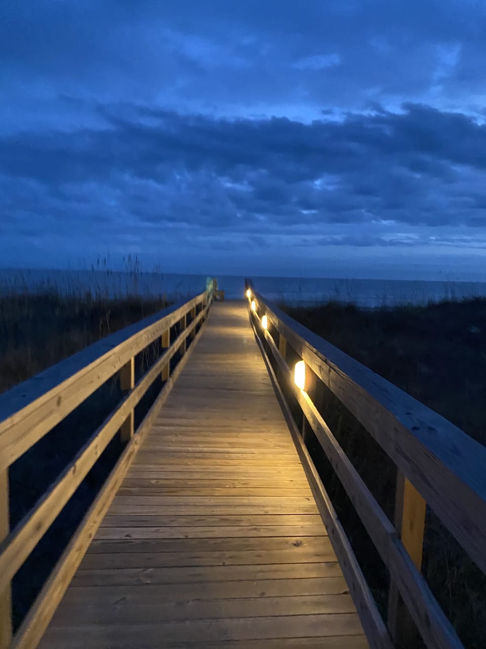 Lighted walkway to the beach