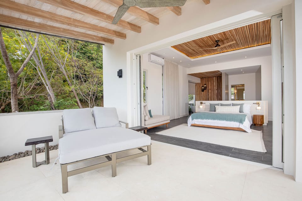 Terrace Master Suite - Relax and read a book or catch up on your favorite show from your private balcony, while taking in the ocean breeze.
