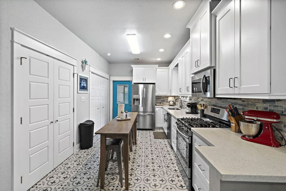 This kitchen is completely stocked with more than you could ever ask for!