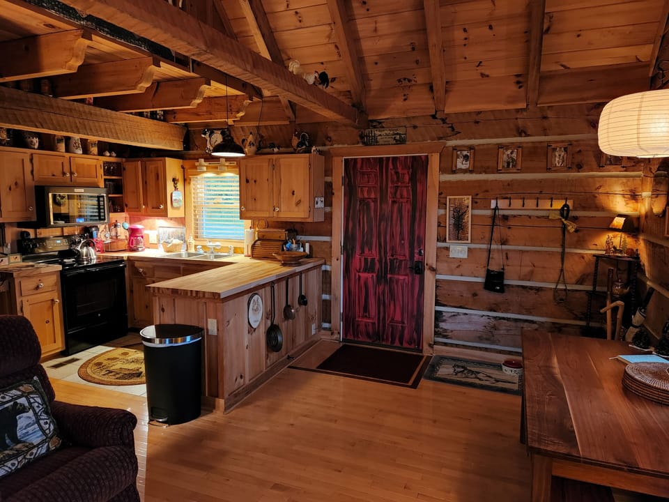 view to the kitchen and dining area from the living room