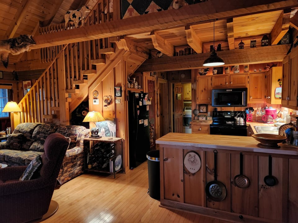 View to living area and kitchen from dining area