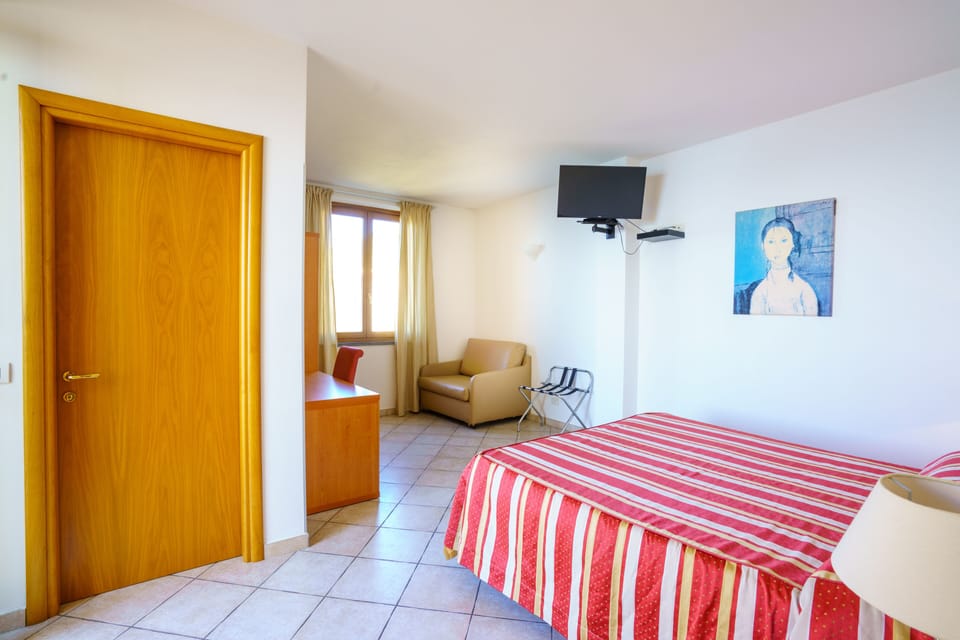 Down comforters, desk, blackout drapes, free WiFi