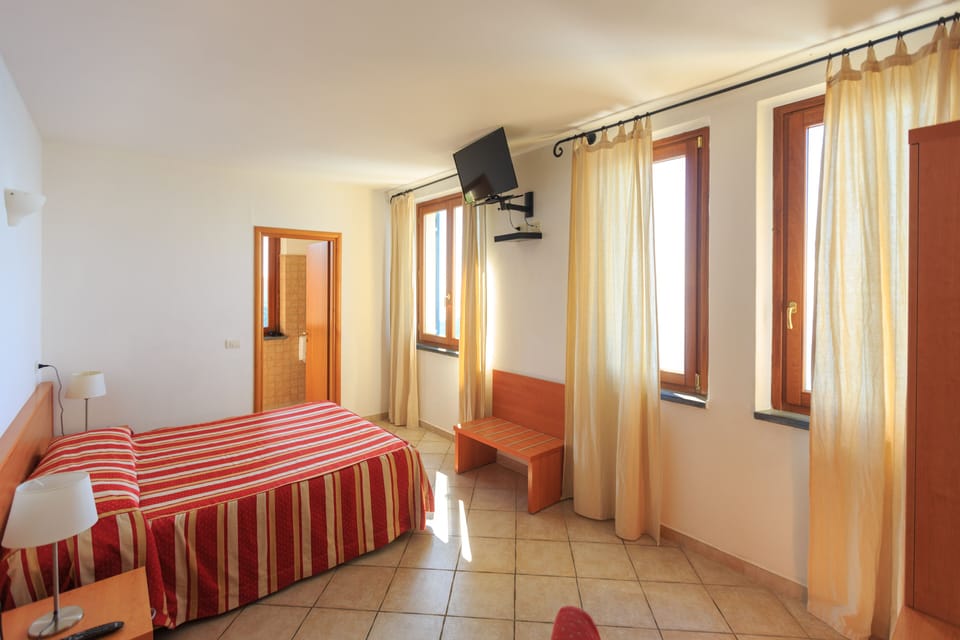 Down comforters, desk, blackout drapes, free WiFi