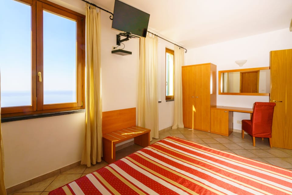 Down comforters, desk, blackout drapes, free WiFi