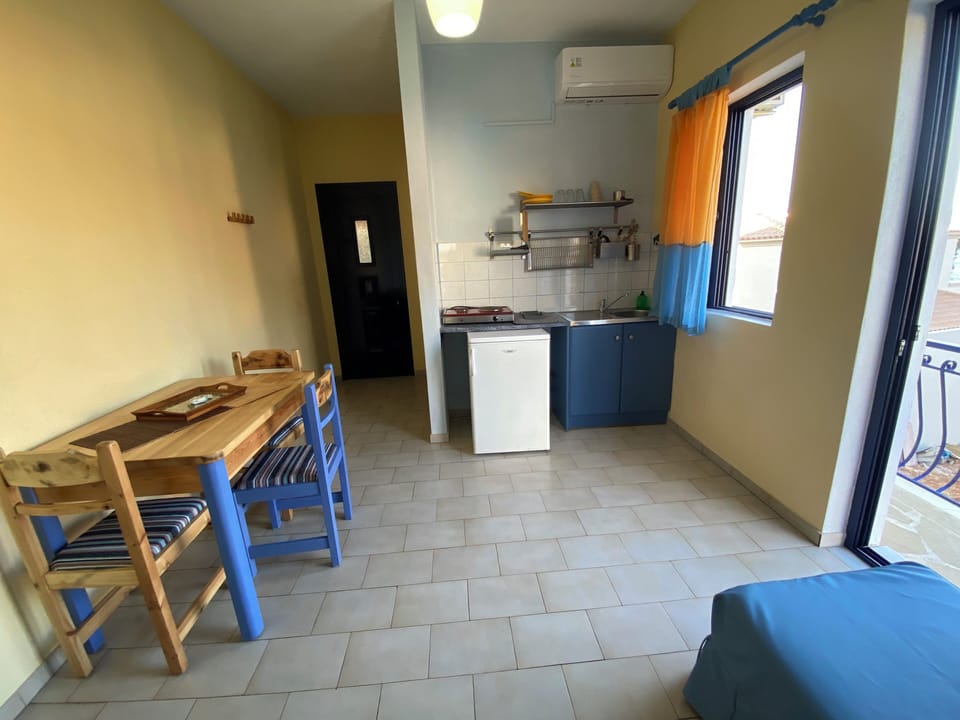 Traditional Apartment, 1 Bedroom, Sea View, Ground Floor | Blackout drapes, iron/ironing board, free WiFi, bed sheets