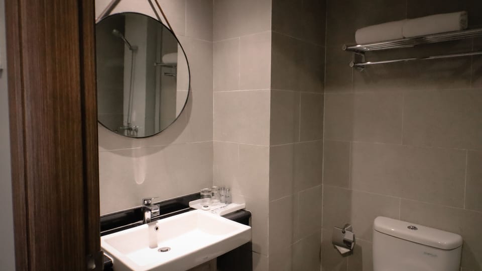 Shower, free toiletries, hair dryer, slippers