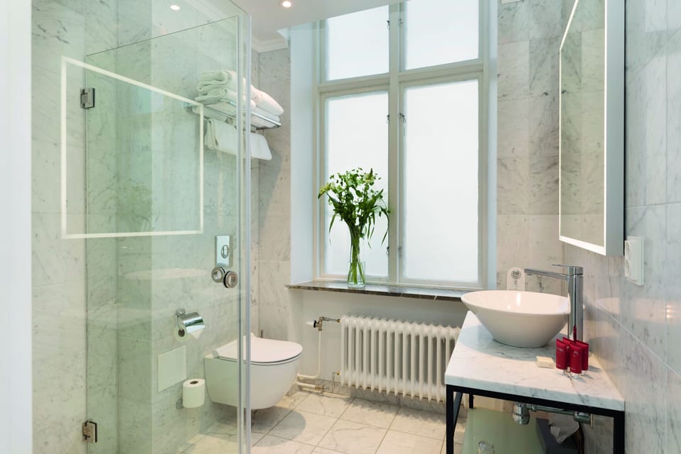 Eco-friendly toiletries, hair dryer, towels