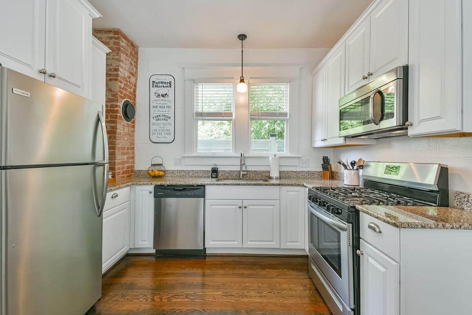Modern kitchen with granite and stainless steel appliances
