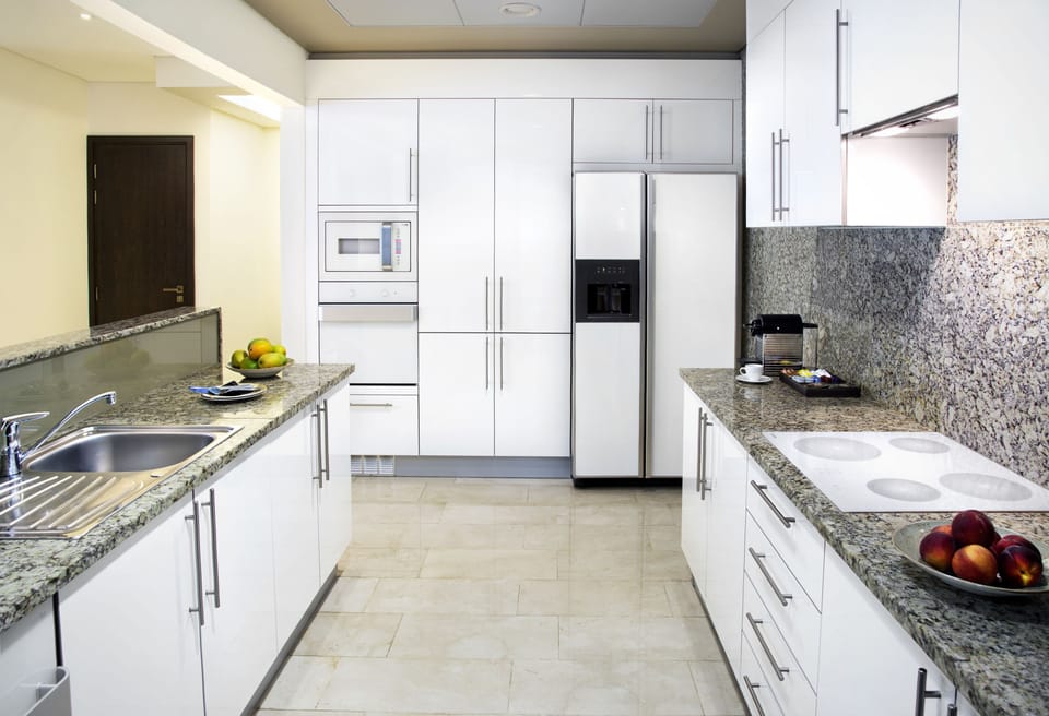 Family Apartment, 2 Bedrooms, Kitchen, City View | Private kitchen | Espresso maker, eco-friendly cleaning products, dining tables