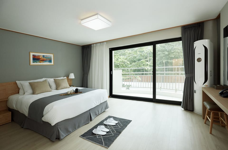 Minibar, desk, laptop workspace, blackout drapes